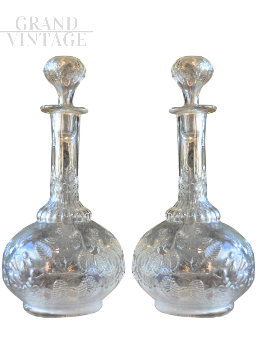 Coppia di bottiglie vintage da vino in vetro