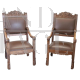 Pair of Renaissance style armchairs in carved walnut, late 19th century