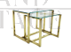 Pair of nesting tables in brass and glass, 1970s