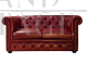 English red Chesterfield sofa