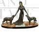Jaques Limousin Art Deco sculpture depicting a lady between two dogs
                            