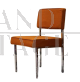 Vintage chair in metal and orange fabric