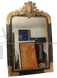 Antique French Louis Philippe mirror, gilded and black lacquered, 19th century