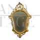 Antique-style gilded wooden shaped mirror