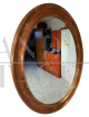 Vintage 70s oval mirror in gold and bronze wood