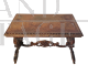 Antique carved desk table with studded leather top