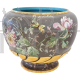 Vintage ceramic vase painted with flowers, butterflies and birds
