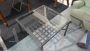 Tavolino stile industriale con piano in vetro