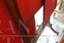 Paracamino antico allargabile in stoffa rossa, 1800
