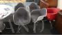 Set di 4 poltroncine Eames Plastic Armchairs DAR Vitra imbottite grigie                            