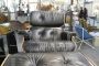 Poltrona con pouf in stile Eames in pelle nera, anni '70