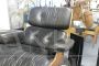 Poltrona con pouf in stile Eames in pelle nera, anni '70