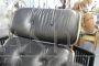 Poltrona con pouf in stile Eames in pelle nera, anni '70