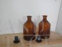 Coppia di bottiglie vintage da farmacia in vetro con tappo