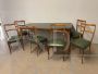 Set salotto modernariato con tavolo con piano in vetro e sedie in skai verde