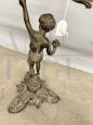 Coppia di candelabri in bronzo del '900 a cinque fiamme con putti