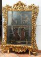 Specchiera antica stile Luigi XV in legno dorato e intagliato