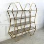 Libreria design a 4 ripiani in ottone dorato e vetro fumé                            