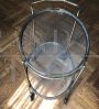 Carrello da sala vintage ovale a due piani in ottone e vetro