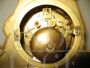 Orologio antico in bronzo dorato al mercurio