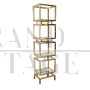 Libreria design a cubi in ottone e vetro                            
