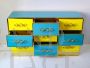 Cassettiera design con 9 cassetti in vetro giallo e azzurro 