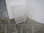 Carrello espositore vintage in rete metallica con 7 cassetti                            
