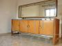 Grande credenza con specchiera di Osvaldo Borsani per La Permanente Mobili Cantù, anni '50