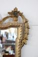 Specchiera in legno intagliato e dorato stile antico, primi '900