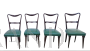 Set di 4 sedie vintage modello Papillon in legno e skai verde                            