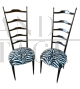Coppia di sedie Chiavarine in ebano con schienale alto