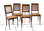 Gruppo di quattro sedie antiche in massello di mogano con innesti in bronzo                            
