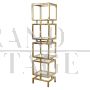 Libreria design a cubi in ottone e vetro                            