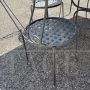 Set da giardino con 6 sedie e un grande tavolo in ferro battuto
