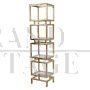 Libreria design a cubi in ottone e vetro                            