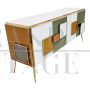 Credenza illuminata con 4 ante in vetro colorato con geometrie