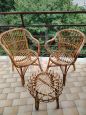Set di due poltroncine e tavolino vintage in vimini                            