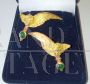 Coppia di orecchini vintage con angeli in oro e smeraldi