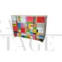 Comò a 4 cassetti in vetro colorato con dettagli in ottone                            