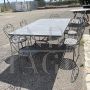 Set da giardino con 6 sedie e un grande tavolo in ferro battuto                            