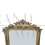 Specchio antico dell'800 in legno intagliato e dorato                            