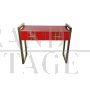 Consolle in vetro rosso con due cassetti                            
