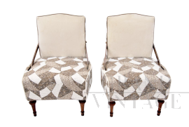 Coppia di poltrone vintage design con schienale double face                            