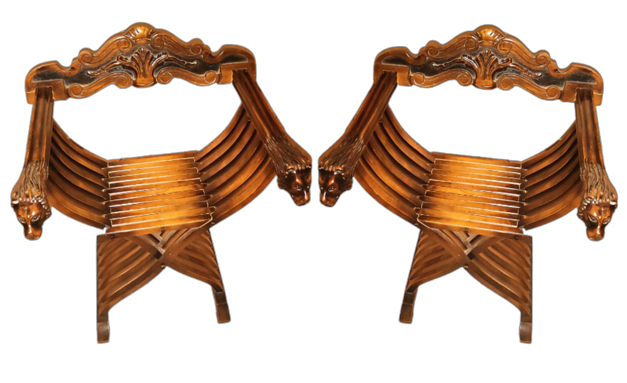 Pair of Savonarola chairs with carvings of lion heads