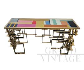 Consolle bifacciale geometrica in acciaio cromo-oro e top in vetro di Murano multicolore