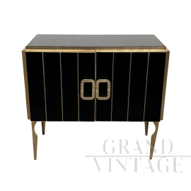 Credenza a due ante in vetro nero e ottone dorato                            