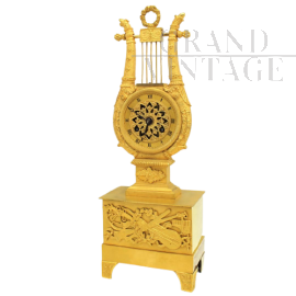 Antique Parisian Empire lyre clock in gilded bronze from the 19th century  