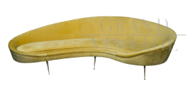 Vintage yellow sofa with a shaped line