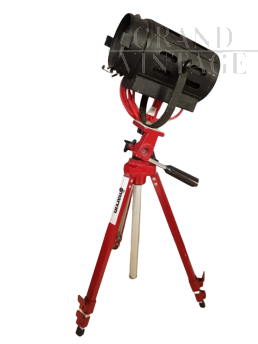 Small vintage cinema spotlight with tripod