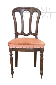 Antique single chair from the 19th century covered in peach colored velvet